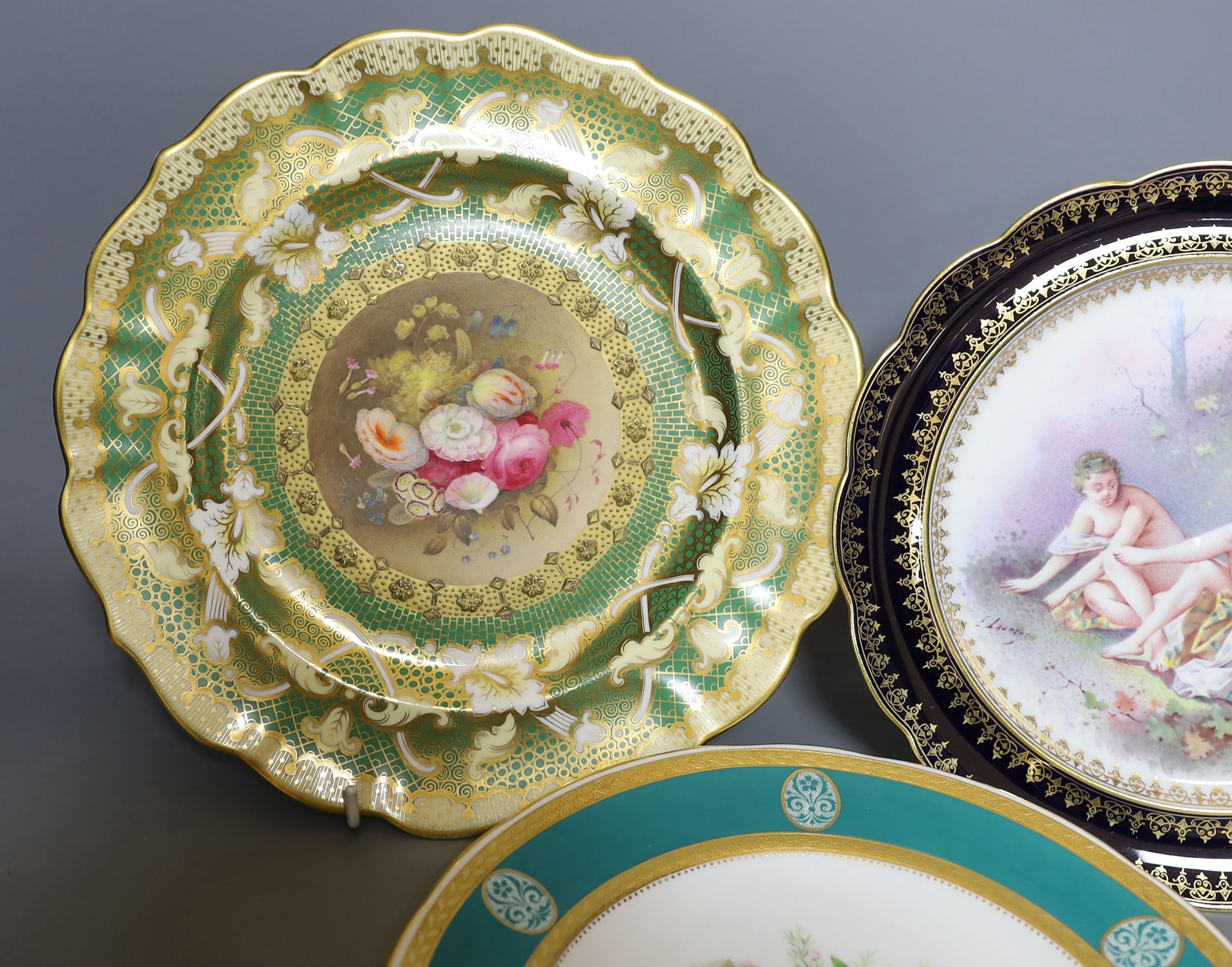 Two 19th century English porcelain flower painted plates, one by Minton and a continental porcelain plate painted with bathers by E Laurent (3)